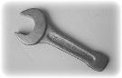 Open end slugging wrench